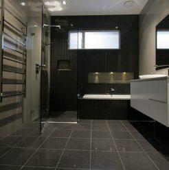 Sydney Bathroom Renovators - Black Bathroom With Flooring Tiles
