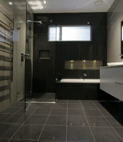 Sydney Bathroom Renovators - Black Bathroom With Flooring Tiles