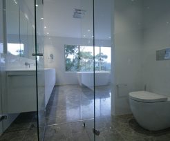 Sydney Bathroom Renovators - Large bathroom with glass door shower