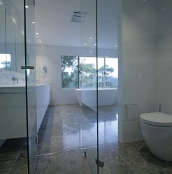 Sydney Bathroom Renovators - Large bathroom with glass door shower