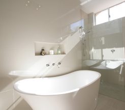 Sydney Bathroom Renovators - Small white and round bathtub in corner