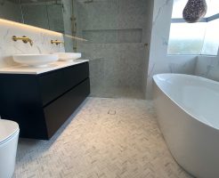 Herringbone and Marble Tile Elegant Bathroom Renovations Sutherland Shire