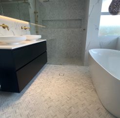 Herringbone and Marble Tile Elegant Bathroom Renovations Sutherland Shire
