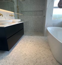 Herringbone and Marble Tile Elegant Bathroom Renovations Sutherland Shire